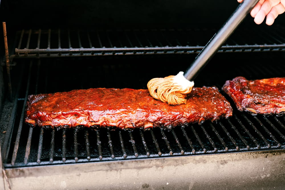 How to BBQ perfect tender and juicy St. louis Style Pork Ribs on the smoker every time. This is the best rib recipe you'll ever try!