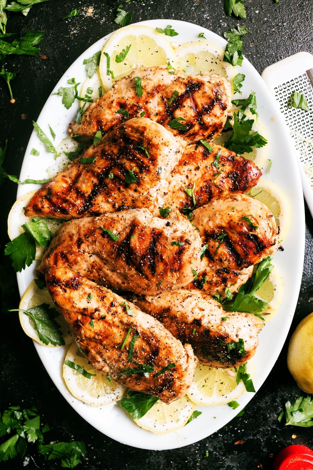 This Lemon Garlic Marinated Grilled chicken breast is flavorful, juicy, and the perfect meal perfect for any backyard barbecue!