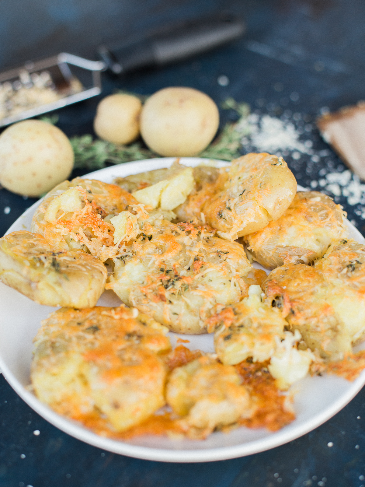 Buttery Herb and Cheese Smashed Potatoes - Dad With A Pan