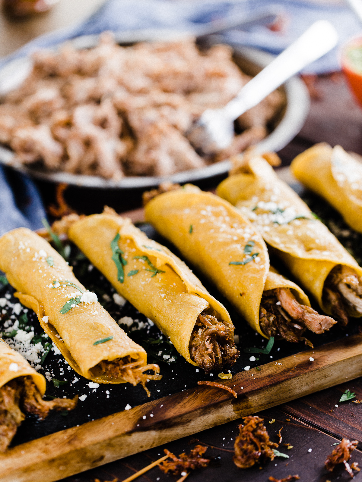 Slow Cooker Pulled Pork Taquitos - Dad With A Pan