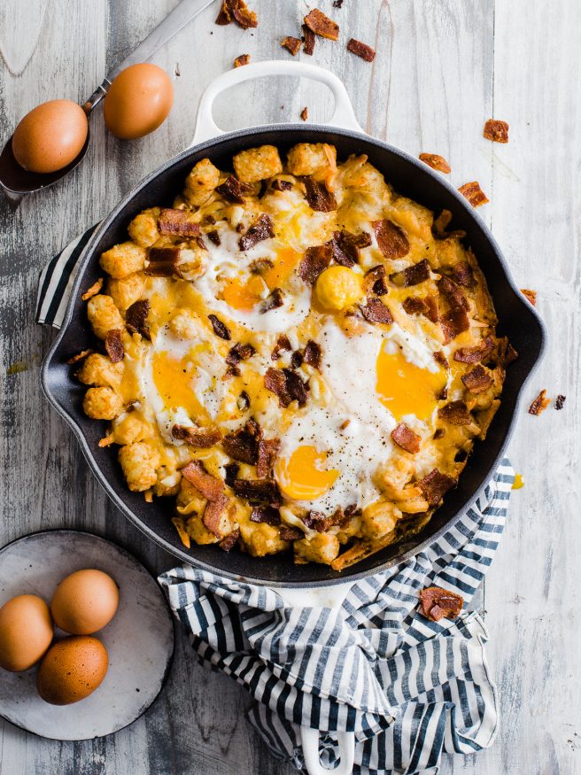 Making an easy breakfast dish with with Bacon Egg and Cheese Totchos. This makes the perfect candidate for a breakfast to cook up with the kids! 