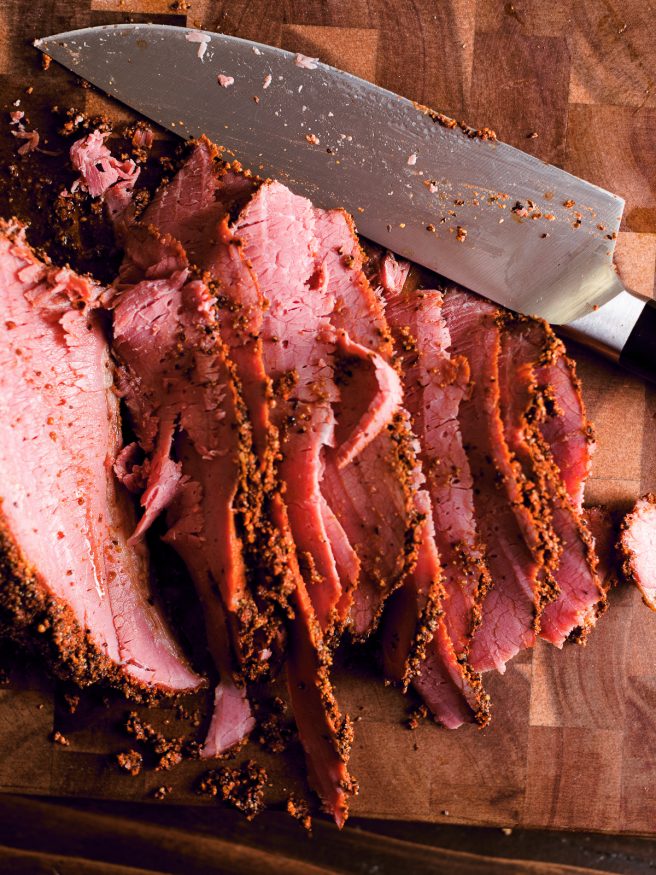 Save a few days of waiting and skip brining your brisket for Smoked Pastrami and use a corned beef packer. Slow smoked, then steamed, making an amazing home-made pastrami!