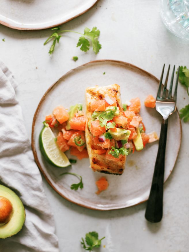 Quick and easy grilled Halibut topped with a zesty grapefruit avocado salsa is a great way to add a little freshness to your weeknight dinner. 