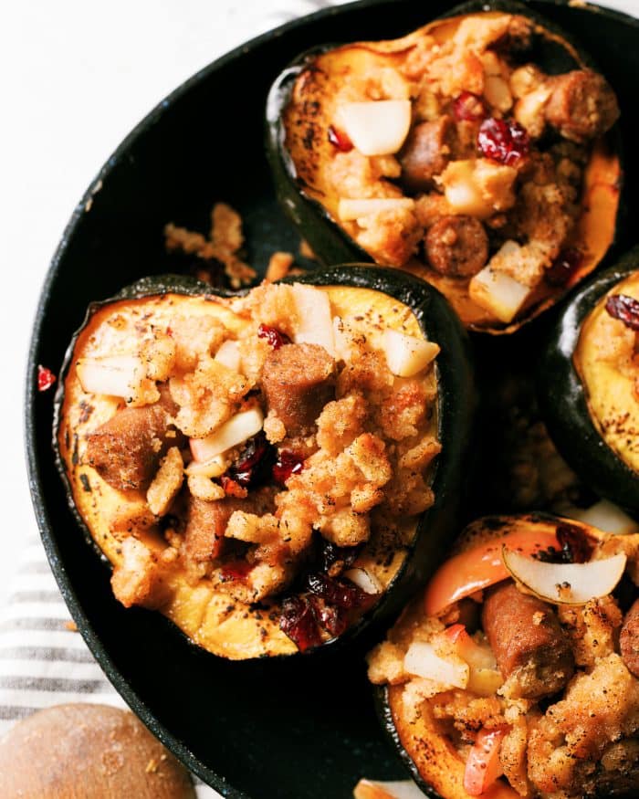 Roasted Acorn Squash with a sweet and savory breakfast  stuffing that is plant-based. Easily interchangeable with meat proteins to make this perfect everyone