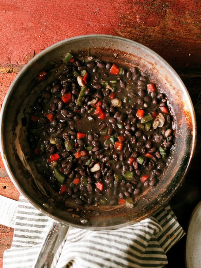 Cuban Beans take standard black beans to a whole other level. Seasoned with cumin and other spices along with some bell pepper and onions. 
