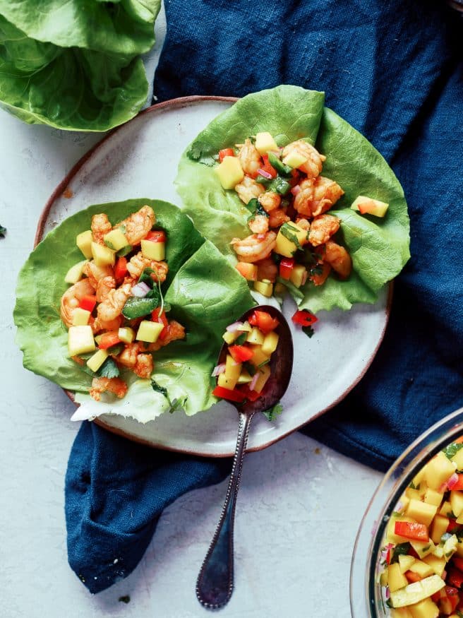 Margarita shrimp for lettuce wraps served up with a beautiful mango salsa. This is an amazing lunch or dinner!