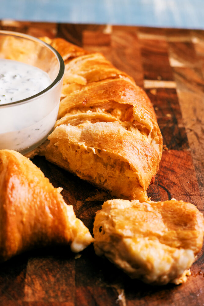 This Buffalo Chicken Crescent Ring checks all the boxes – it’s quick, packed with buffalo flavor, wrapped in  buttery crescent rolls that's perfect for feeding a crowd.