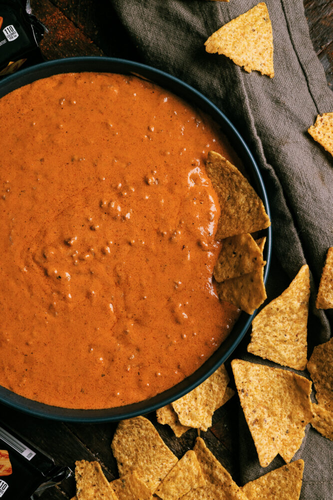 Easy chili cheese dip packed with creamy cheese, savory chili, and bold spices. Perfect for game day with Fritos, chips, or veggies!