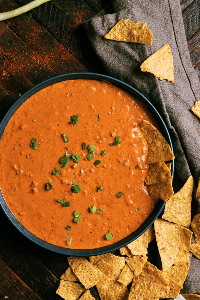 Easy chili cheese dip packed with creamy cheese, savory chili, and bold spices. Perfect for game day with Fritos, chips, or veggies!